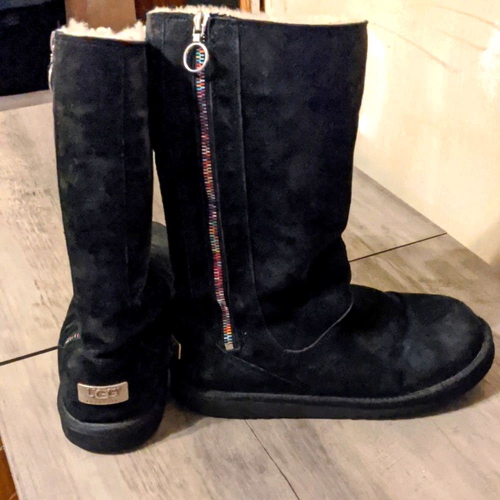 Ugh black leather boots lined in sheepskin rainbow zipper